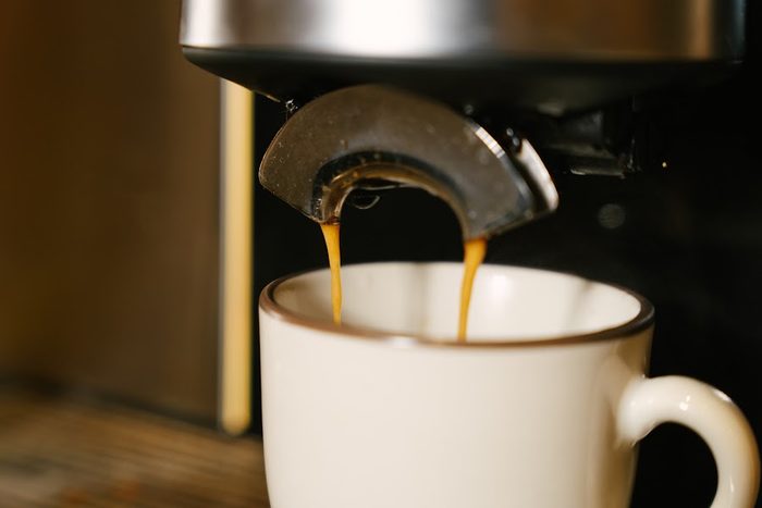 Espresso pouring into a cup at YOUNG Coffee