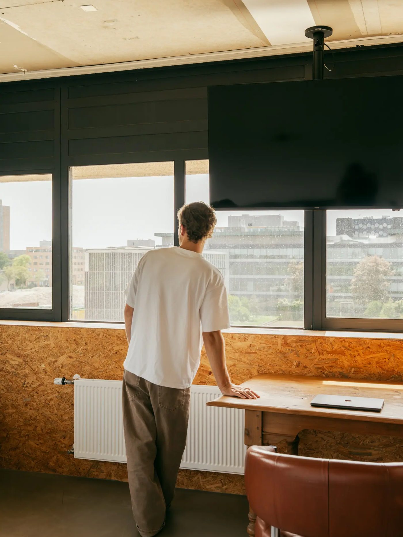 Working at the window counter of a YOUNG Campus room