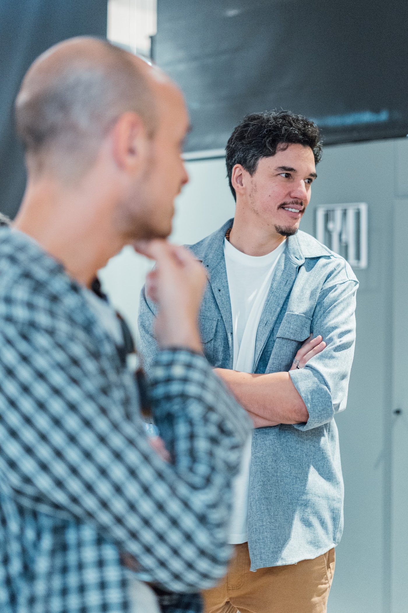 Two members in conversation at a YOUNG event