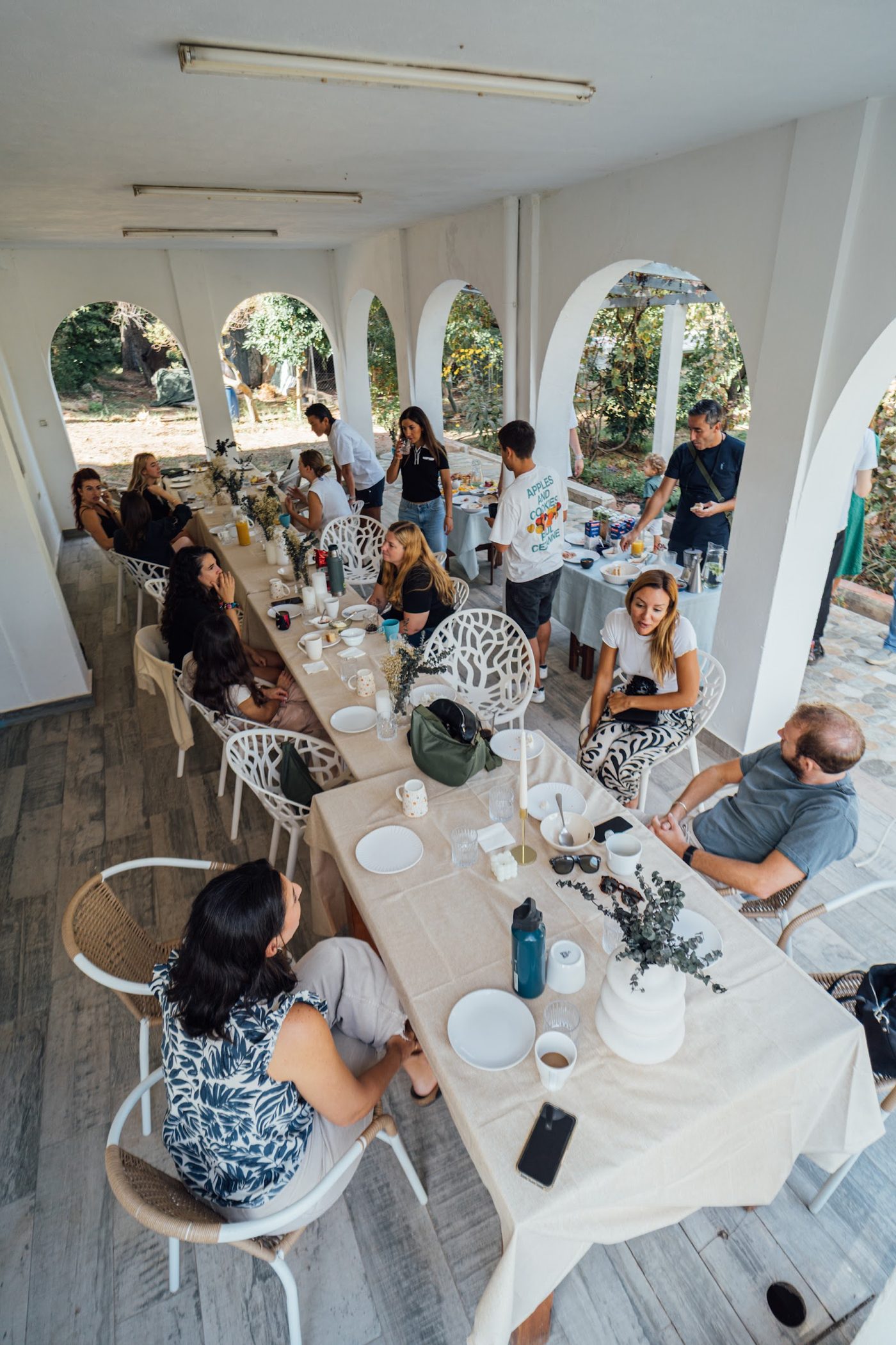 A long table laid for dinner, seen from above