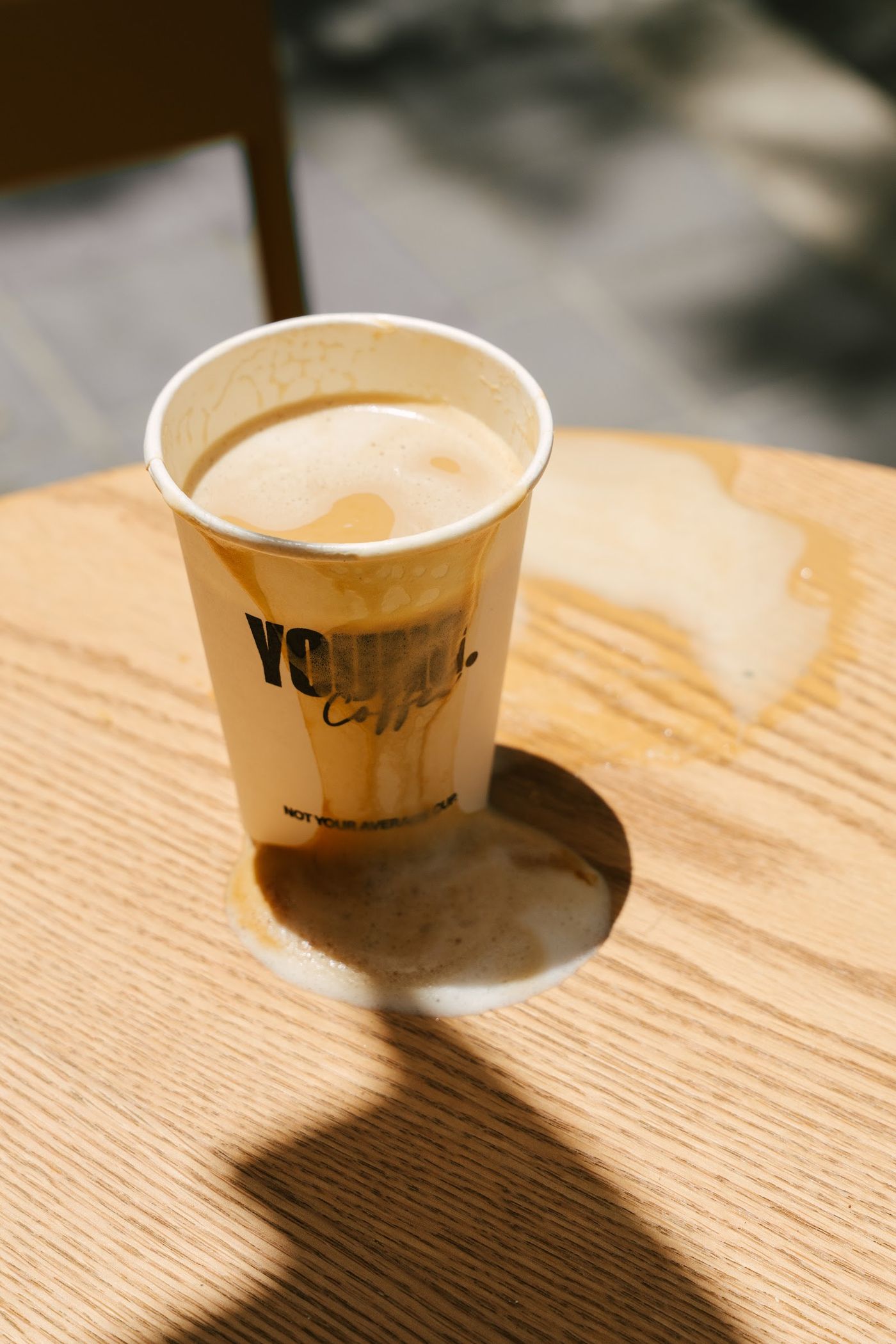 Coffee in sunlight at a YOUNG caf&eacute;