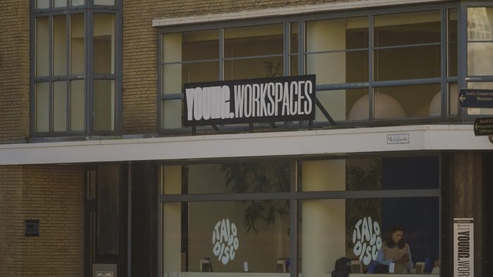 The facade of a YOUNG.Workspaces building